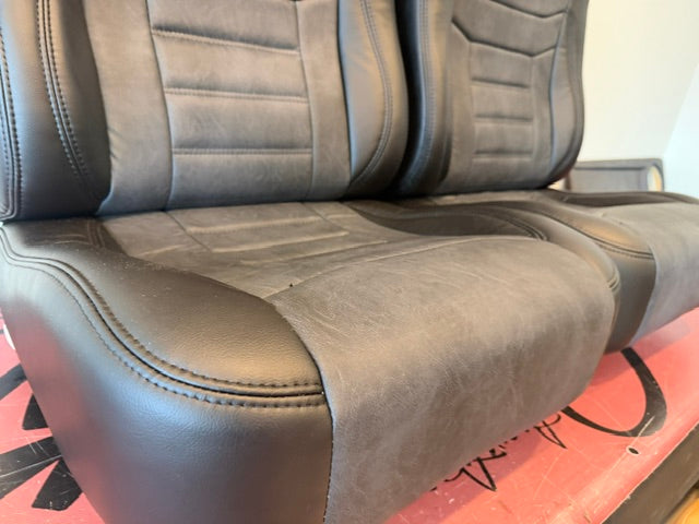 Universal Bucket Seats – Black Ebony Vinyl with Distressed Black Inserts (In Stock)