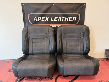 Universal Bucket Seats – Black Ebony Vinyl with Distressed Black Inserts (In Stock)