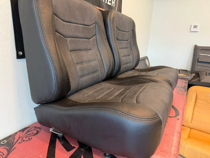 Universal Bucket Seats – Black Ebony Vinyl with Distressed Black Inserts (In Stock)